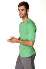 A vibrant bamboo green short-sleeved hybrid crew neck raglan tee made of soft cotton fabric
