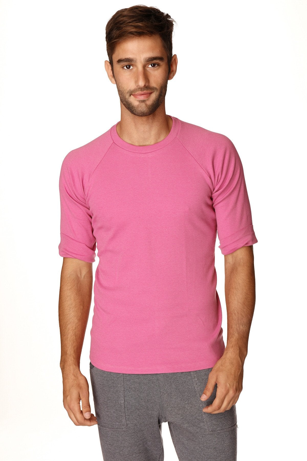 A vibrant pink berry hybrid crew neck raglan tee with short sleeves and a round neckline for casual wear