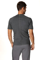 Dark gray heathered short-sleeved hybrid crew neck raglan tee showing back with subtle vertical seam down center