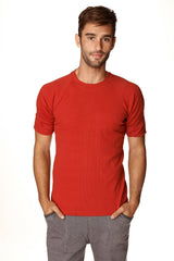 Red hybrid crew neck raglan tee with short sleeves and ribbed cuffs made from soft breathable fabric