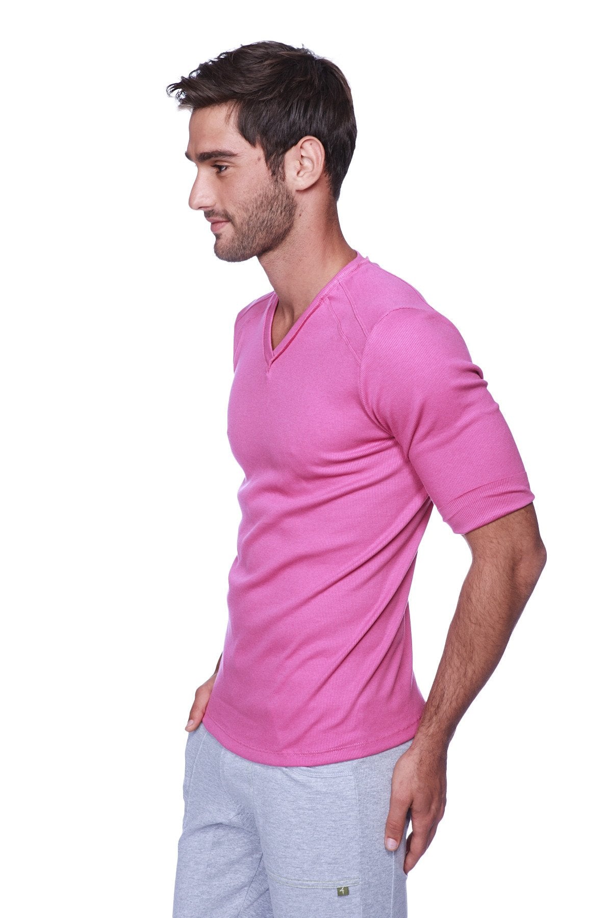 A vibrant pink hybrid v-neck short-sleeved t-shirt made of soft stretchy fabric perfect for casual wear