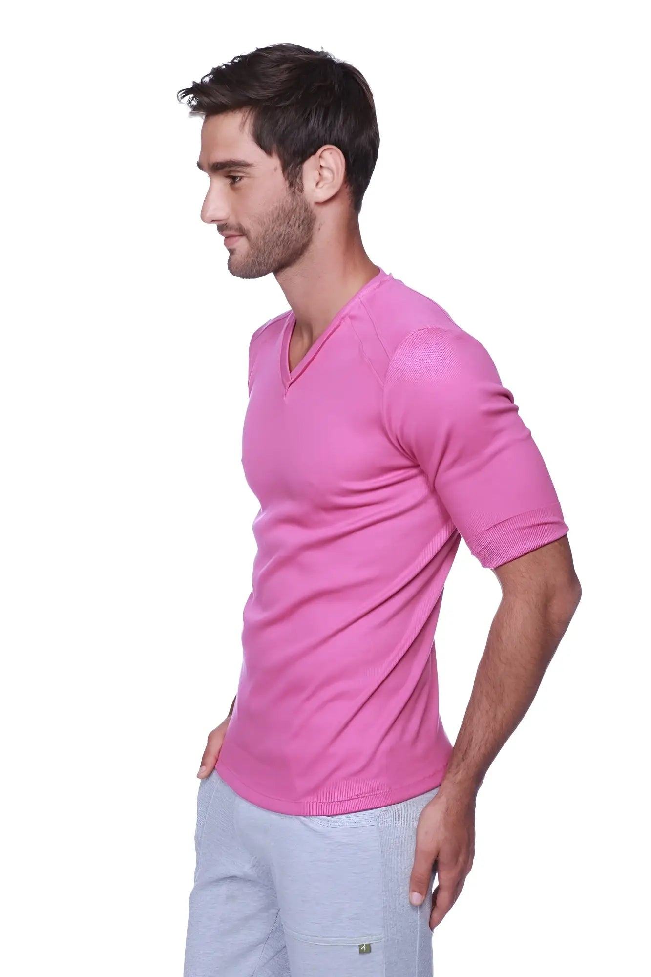 A vibrant pink hybrid v-neck short-sleeved t-shirt made of soft stretchy fabric perfect for casual wear