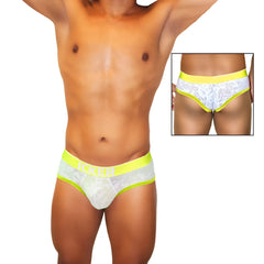 White lace men’s briefs with neon yellow trim and waistband featuring a subtle pattern by icker sea acid mesh piping