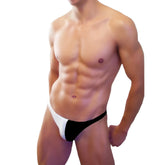 Black and white Icker Sea bicolor thong swimwear with bold color-block design and athletic fit for swim use