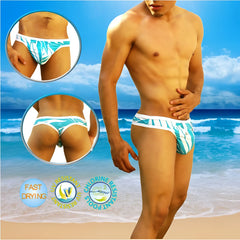Icker Sea Blue Waves tanga thong swimwear in turquoise and white quick-drying fabric with tropical leaf design
