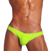 Bright neon green form-fitting icker sea bottomless jock bikini jock strap underwear with ikar logo embroidered on front