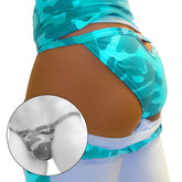 Turquoise camouflage-patterned thong with gray and black camo design and brand tag on waistband backside view