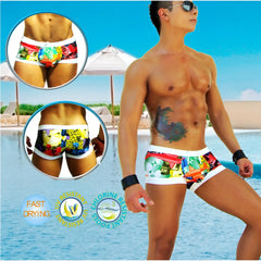 Icker Sea City Low Square Cut Trunk swimwear featuring vibrant comic-book-themed design with white waistband