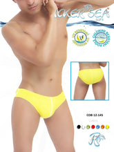 Icker Sea contrast line slip bikini swimwear mango bright yellow men’s swim trunks with white side trim and sleek design