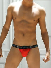 Red microslip bikini briefs with black elastic waistband featuring white wicker branding and small logo patterns