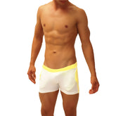 White athletic briefs with bright yellow waistband and side panels from icker sea contrast side panel jock shorts mango shr 19 01