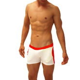 White swim trunks Icker Sea jock shorts with bold red waistband and contrast side panels for swimwear use