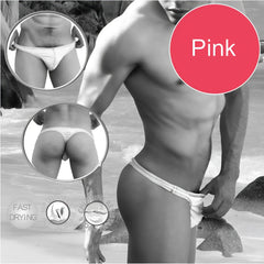 Pink men’s swim trunks with a white textured waistband featuring contrast stitching tanga thong design