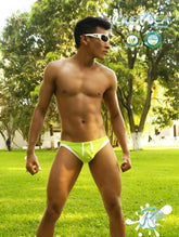 Bright lime green icker sea micro slip bikini swimwear with white contrast trim and drawstrings for swimming