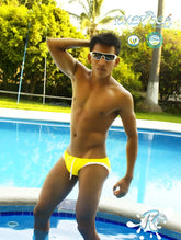 Icker Sea micro slip bikini swimwear in mango yellow with white contrast trim and a small white drawstring