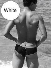 White swim trunks with contrasting black panel and trim from icker sea cheeky mini bikini swimwear cob 15 39