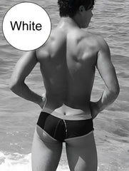White swim trunks with contrasting black panel and trim from icker sea cheeky mini bikini swimwear cob 15 39