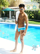 Blue and white icker sea cheeky mini bikini swimwear with contrast trim and stitching in a sleek modern design