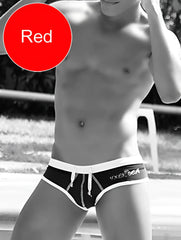 Black and white swim trunks with white waistband and vixen branding along the side from icker sea bikini swimwear