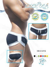 Black and white Icker Sea Curved Hemline U Shorts swim trunks with sleek modern panels and a drawstring waistband