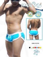 Icker Sea curved hemline u shorts square cut trunk swimwear in bright blue and white with turquoise side panels