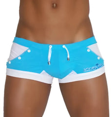 Bright blue icker sea eyelets square cut trunk swimwear with white side panels and matching drawstring waistband