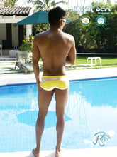 Icker Sea eyelets square cut trunk swimwear in yellow and white with a subtle patterned design for beachwear