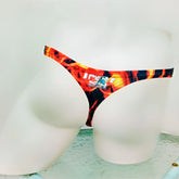 Vibrant orange and black flame-patterned icker sea fire red thong underwear with ice logo patch front view