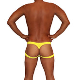 Bright yellow low-rise thong jock strap underwear with wide waistband and leg straps mango by icker sea