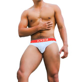 Light blue icker sea kiss my ass brief underwear with red waistband and white lettering for comfortable wear