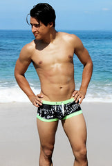 Icker Sea letters square cut trunk swimwear in black and neon green with white graphic print