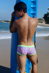 Icker Sea letters square cut trunk swimwear in pink and green with vibrant text heart pattern and neon green trim