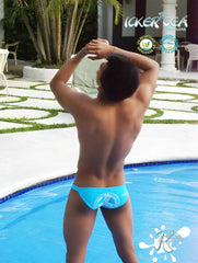 Back view of bright blue icker sea lifeguard micro slip bikini swimwear with white logo on swim trunks
