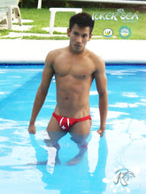 Red icker sea lifeguard micro slip bikini swimwear with white cross design and red swim trunks front view