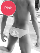 Icker Sea lifeguard slip bikini swimwear pink swim trunks with circular logo design for beach and pool use