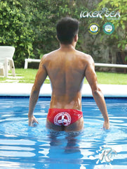 Icker Sea lifeguard slip bikini swimwear red with white circular logo featuring text and graphics on the front side