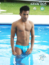 Bright blue icker sea lifeguard stitching tanga thong swimwear with white drawstrings in front view