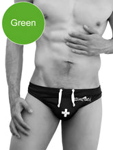 Black Icker Sea lifeguard tanga thong swimwear with white drawstrings and cross emblem front for beach use