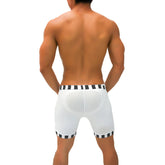 White athletic shorts with black and white striped trim and padded back panel from icker sea lines candy stripe trim shorts and jock brief underwear black shr-21-01