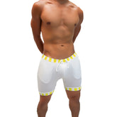 White mesh shorts with yellow and white striped elastic waistband and hem and drawstring closure from icker sea lines