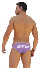 Back side of purple icker sea slip bikini underwear with white lace trim and kiss my ass text across the back