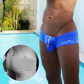 Royal blue icker sea low rise scrunched back cheeky mini square cut trunk swimwear with white drawstring and branding