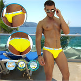 Bright yellow icker sea sailor belted logo slip bikini swimwear with white elastic waistband and craze logo in blue