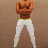 Icker Sea Side Stripe runner pants white with bright neon yellow waistband and subtle blue logo on the thigh