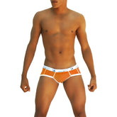 Orange textured brief underwear with white trim and blue Icker Sea logo on waistband COI-13-14 front view
