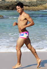 Icker Sea spring square cut trunk swimwear in pink blue tie dye with vibrant pattern and bright pink waistband