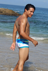 Icker Sea spring square cut swim trunks in pink and blue with blue and white tropical patterned fabric