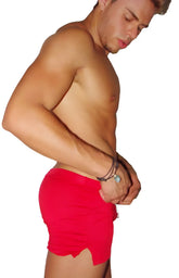 Icker Sea red athletic tennis shorts with scalloped hemline and side slit for comfortable activewear use
