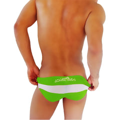 Bright green and white striped men’s swim trunks with joker sea logo embroidered on waistband for beachwear