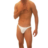 White icker sea trapezoid thong underwear in smooth fabric with a form-fitting design shown from the back